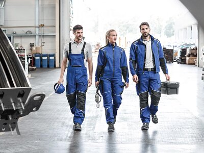 Kübler série Bodyforce Tři pracovníci v pracovním oblečení